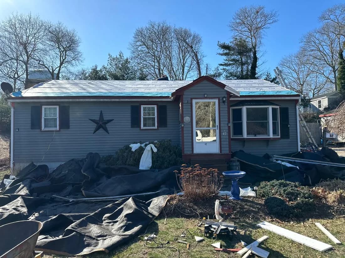 Cape house after an asphalt shingle roof replacement