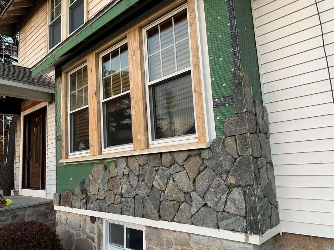 Natural stone veneer on a home's front wall